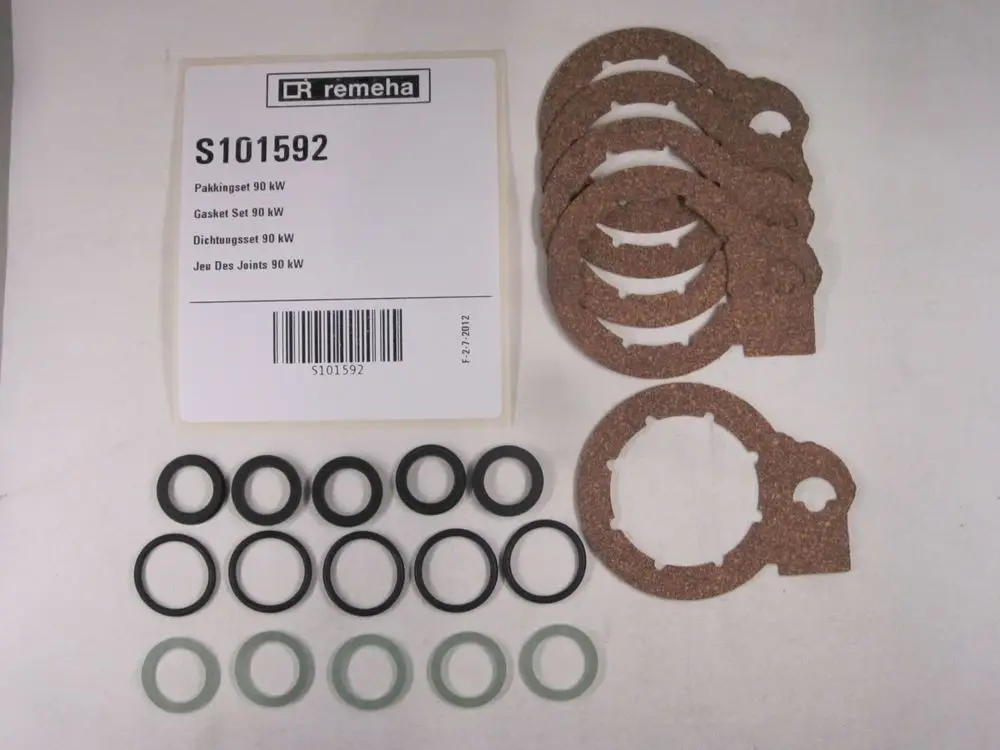 Gasket set von Remeha mit verschiedenen Dichtungen, darunter runde und ovale Gummidichtungen sowie Korkdichtungen, angeordnet auf hellem Hintergrund.